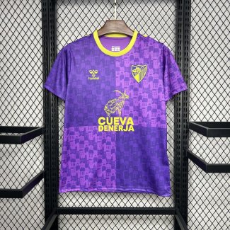 Camiseta Malaga Purple pre match training 2024/2025